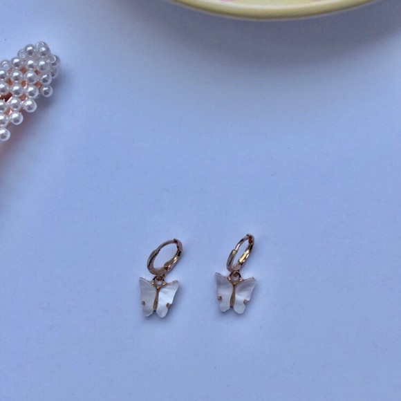 Urban Outfitters Accessories - White butterfly earrings